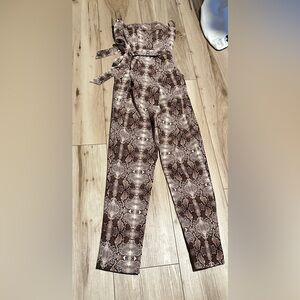 NY&Co snakeskin jumpsuit. Wrinkle free fabric. Sexy & new